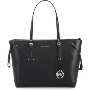 New black Michael Kors Voyager tote